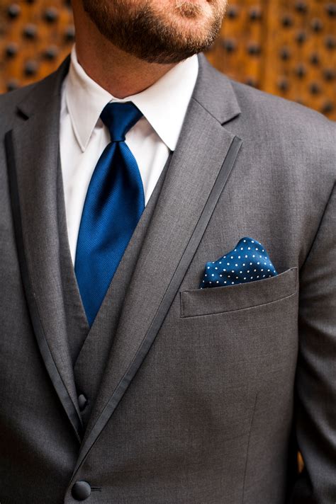 grey tux with navy tie.